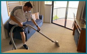 Professional carpet cleaning - Technician cleaning a carpet using specialized equipment